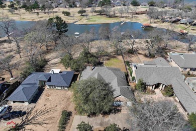 Timeless waterfront beauty in Emerald Bay on Lake Palestine! on Emerald Bay Club in Texas - for sale on GolfHomes.com, golf home, golf lot