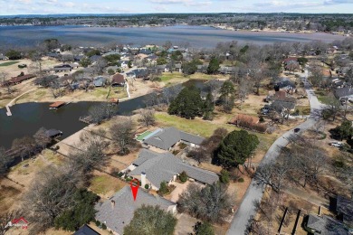 Timeless waterfront beauty in Emerald Bay on Lake Palestine! on Emerald Bay Club in Texas - for sale on GolfHomes.com, golf home, golf lot