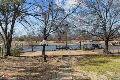 Timeless waterfront beauty in Emerald Bay on Lake Palestine! on Emerald Bay Club in Texas - for sale on GolfHomes.com, golf home, golf lot