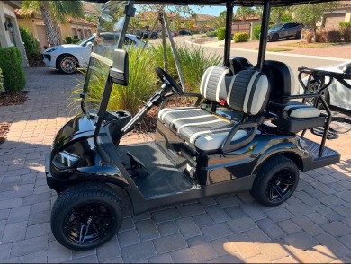 Spring into Savings with a $7,500 credit for you to apply on Esplanade Golf and Country at Lakewood Ranch in Florida - for sale on GolfHomes.com, golf home, golf lot