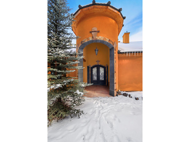 Perfectly positioned on the 10th green of the Angel Fire Resort on Angel Fire Resort Country Club in New Mexico - for sale on GolfHomes.com, golf home, golf lot