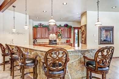 Perfectly positioned on the 10th green of the Angel Fire Resort on Angel Fire Resort Country Club in New Mexico - for sale on GolfHomes.com, golf home, golf lot