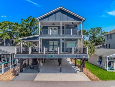 LUXURY at the BEACH!!! This 4 bedroom 3.5 bath raised beach on Prestwick Country Club in South Carolina - for sale on GolfHomes.com, golf home, golf lot