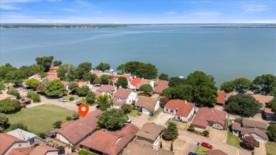 Nestled on a hilltop with a view of Lake Ray Hubbard, in the on Lakeside Village Golf Course in Texas - for sale on GolfHomes.com, golf home, golf lot