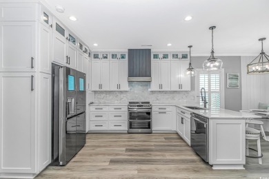 LUXURY at the BEACH!!! This 4 bedroom 3.5 bath raised beach on Prestwick Country Club in South Carolina - for sale on GolfHomes.com, golf home, golf lot
