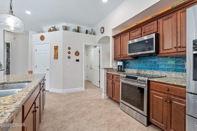 Located in the highly sought after, guard gated community of on Plantation Bay Golf and Country Club in Florida - for sale on GolfHomes.com, golf home, golf lot