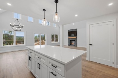 This stunning 3-bed, 4-bath single family home on over an acre on Owls Nest Golf Course in New Hampshire - for sale on GolfHomes.com, golf home, golf lot