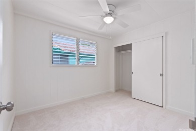 Nestled in a quiet and highly convenient location, this on Moanalua Golf Club in Hawaii - for sale on GolfHomes.com, golf home, golf lot