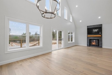 This stunning 3-bed, 4-bath single family home on over an acre on Owls Nest Golf Course in New Hampshire - for sale on GolfHomes.com, golf home, golf lot