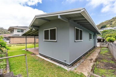 Nestled in a quiet and highly convenient location, this on Moanalua Golf Club in Hawaii - for sale on GolfHomes.com, golf home, golf lot