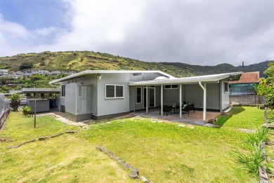 Nestled in a quiet and highly convenient location, this on Moanalua Golf Club in Hawaii - for sale on GolfHomes.com, golf home, golf lot