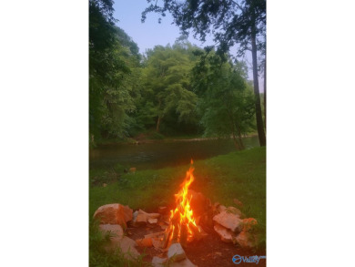 Backyard dreams come true here-with direct access to a beautiful on Athens Golf and Country Club in Alabama - for sale on GolfHomes.com, golf home, golf lot