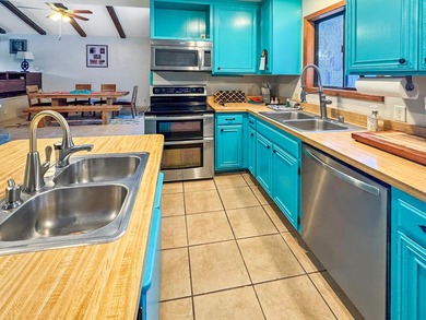 Come see this spacious 4-bedroom, 3-bath split-level, 2-story on Angel Fire Resort Country Club in New Mexico - for sale on GolfHomes.com, golf home, golf lot