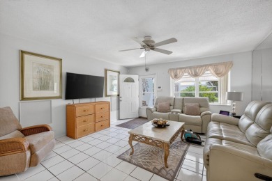 Welcome to this stunning 2-bedroom, 2-bathroom corner home on Leisureville Community Association in Florida - for sale on GolfHomes.com, golf home, golf lot
