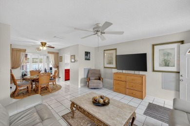 Welcome to this stunning 2-bedroom, 2-bathroom corner home on Leisureville Community Association in Florida - for sale on GolfHomes.com, golf home, golf lot