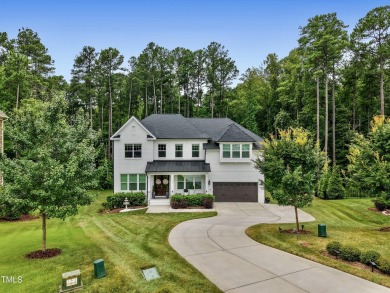 Behind the gates of Hasentree Country Golf Club community on Hasentree Club in North Carolina - for sale on GolfHomes.com, golf home, golf lot