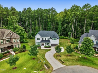 Behind the gates of Hasentree Country Golf Club community on Hasentree Club in North Carolina - for sale on GolfHomes.com, golf home, golf lot