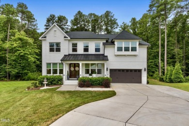 Behind the gates of Hasentree Country Golf Club community on Hasentree Club in North Carolina - for sale on GolfHomes.com, golf home, golf lot
