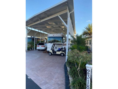 RV lot with double port, full hookups, shed with washer and on Deer Creek RV Golf Resort in Florida - for sale on GolfHomes.com, golf home, golf lot