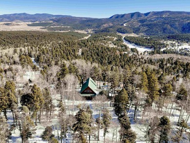Take in big ski mountain views at 14 Sierra Blanca Cir. This on Angel Fire Resort Country Club in New Mexico - for sale on GolfHomes.com, golf home, golf lot