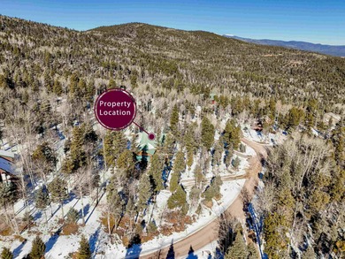 Take in big ski mountain views at 14 Sierra Blanca Cir. This on Angel Fire Resort Country Club in New Mexico - for sale on GolfHomes.com, golf home, golf lot