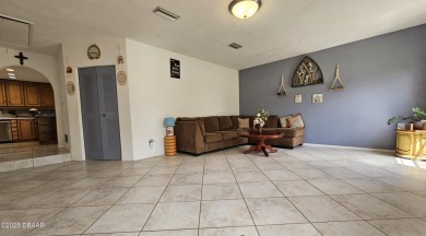 Spacious and versatile, this nearly 3,000 sq ft home is perfect on Riviera Country Club in Florida - for sale on GolfHomes.com, golf home, golf lot
