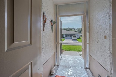 Live the RESORT Lifestyle in this updated 2-bedroom, 2-bath home on Tampa Bay Golf and Country Club in Florida - for sale on GolfHomes.com, golf home, golf lot
