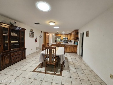 Spacious and versatile, this nearly 3,000 sq ft home is perfect on Riviera Country Club in Florida - for sale on GolfHomes.com, golf home, golf lot