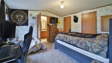 Investors, don't miss this Garrison rental opportunity! Rental on Hardwoods Golf Club At Mille Lacs in Minnesota - for sale on GolfHomes.com, golf home, golf lot