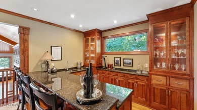 Inspired by the timeless architectural influence of Frank Lloyd on Nevada Country Club in Missouri - for sale on GolfHomes.com, golf home, golf lot