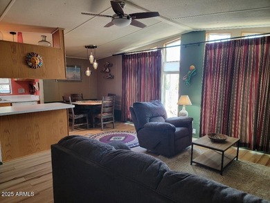 This is a lovely 2 bedroom 2 bath partially furnished home on 3 Parks Fairways in Arizona - for sale on GolfHomes.com, golf home, golf lot