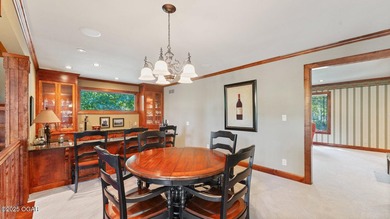 Inspired by the timeless architectural influence of Frank Lloyd on Nevada Country Club in Missouri - for sale on GolfHomes.com, golf home, golf lot