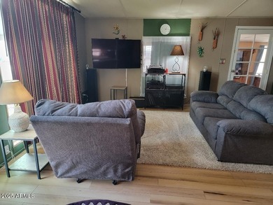 This is a lovely 2 bedroom 2 bath partially furnished home on 3 Parks Fairways in Arizona - for sale on GolfHomes.com, golf home, golf lot