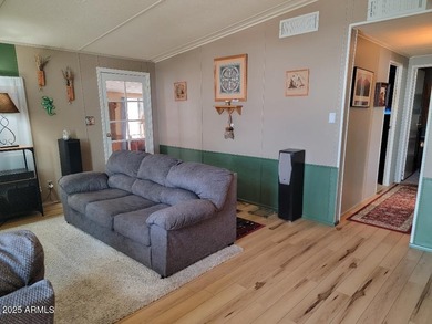 This is a lovely 2 bedroom 2 bath partially furnished home on 3 Parks Fairways in Arizona - for sale on GolfHomes.com, golf home, golf lot