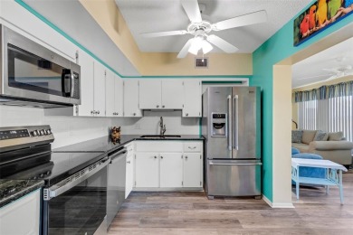 Welcome to this spacious 2-bedroom, 2-bathroom, 1400 sq ft condo on On Top Of The World Golf Course in Florida - for sale on GolfHomes.com, golf home, golf lot