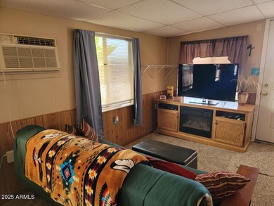 This is a lovely 2 bedroom 2 bath partially furnished home on 3 Parks Fairways in Arizona - for sale on GolfHomes.com, golf home, golf lot