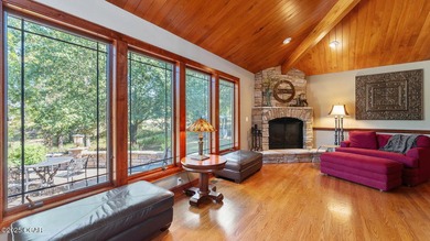 Inspired by the timeless architectural influence of Frank Lloyd on Nevada Country Club in Missouri - for sale on GolfHomes.com, golf home, golf lot