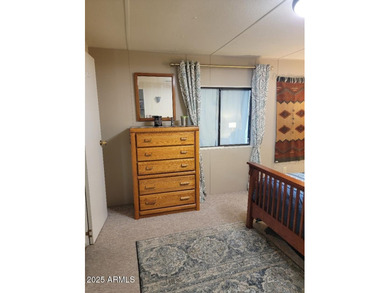 This is a lovely 2 bedroom 2 bath partially furnished home on 3 Parks Fairways in Arizona - for sale on GolfHomes.com, golf home, golf lot