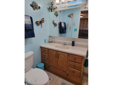 This is a lovely 2 bedroom 2 bath partially furnished home on 3 Parks Fairways in Arizona - for sale on GolfHomes.com, golf home, golf lot