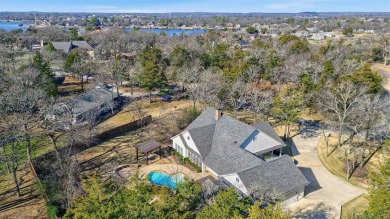 This stunning 4-bedroom, 3.5-bath home with guest suite and on Lake Kiowa Golf Course in Texas - for sale on GolfHomes.com, golf home, golf lot