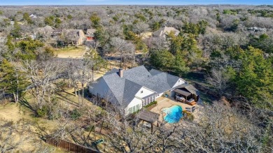 This stunning 4-bedroom, 3.5-bath home with guest suite and on Lake Kiowa Golf Course in Texas - for sale on GolfHomes.com, golf home, golf lot