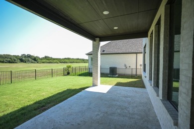 Experience luxury living in this brand-new Windmiller custom on Southern Oaks Golf Club in Texas - for sale on GolfHomes.com, golf home, golf lot