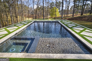 Welcome to 1051 Oliver Creek, a stunning new construction by on Reynolds Lake Oconee - The Oconee in Georgia - for sale on GolfHomes.com, golf home, golf lot