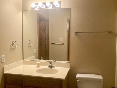 Situated on a hill, this one owner, two lot home allows for the on Holly Lake Ranch Golf Club in Texas - for sale on GolfHomes.com, golf home, golf lot