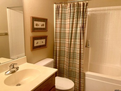 Situated on a hill, this one owner, two lot home allows for the on Holly Lake Ranch Golf Club in Texas - for sale on GolfHomes.com, golf home, golf lot