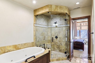 Nestled on the outskirts of the Pisgah National Forest and the on The Cliffs At Walnut Cove in North Carolina - for sale on GolfHomes.com, golf home, golf lot