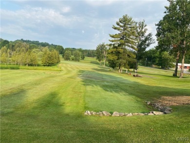 Discover the charm of this cozy tiny log home nestled in the on Cedar Lake Club in New York - for sale on GolfHomes.com, golf home, golf lot