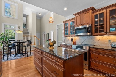 GORGEOUS, GOLF FRONT LIVING IN PINEWILD! Perfectly positioned on on Pinewild Country Club of Pinehurst in North Carolina - for sale on GolfHomes.com, golf home, golf lot