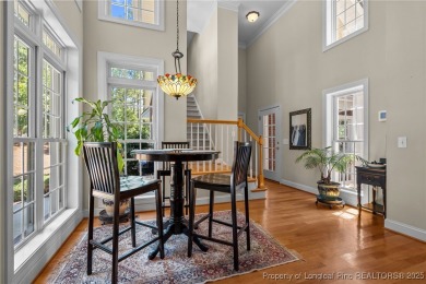 GORGEOUS, GOLF FRONT LIVING IN PINEWILD! Perfectly positioned on on Pinewild Country Club of Pinehurst in North Carolina - for sale on GolfHomes.com, golf home, golf lot
