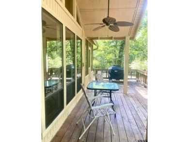 Situated on a hill, this one owner, two lot home allows for the on Holly Lake Ranch Golf Club in Texas - for sale on GolfHomes.com, golf home, golf lot